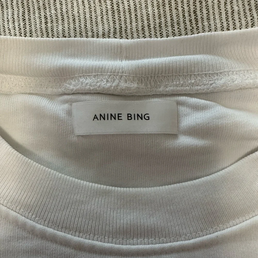 White sweatshirt worn once. - Picture 2 of 3